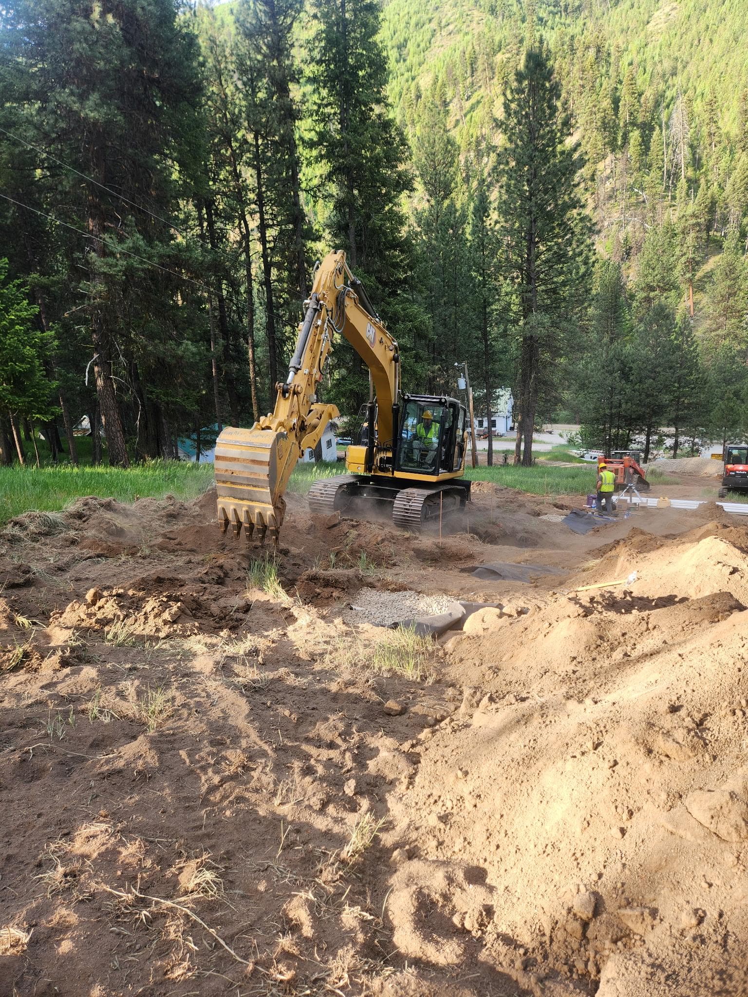 Active excavation on an Idaho drainfield project.